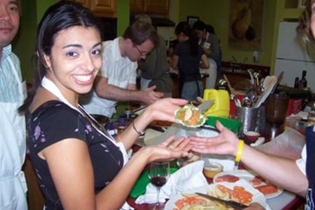 Medium_smiling_lady_presenting_entree